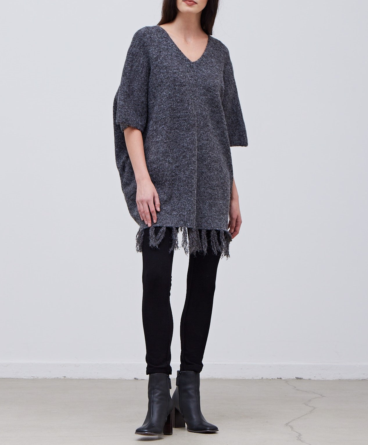 FRINGE HEM KNIT PONCHO