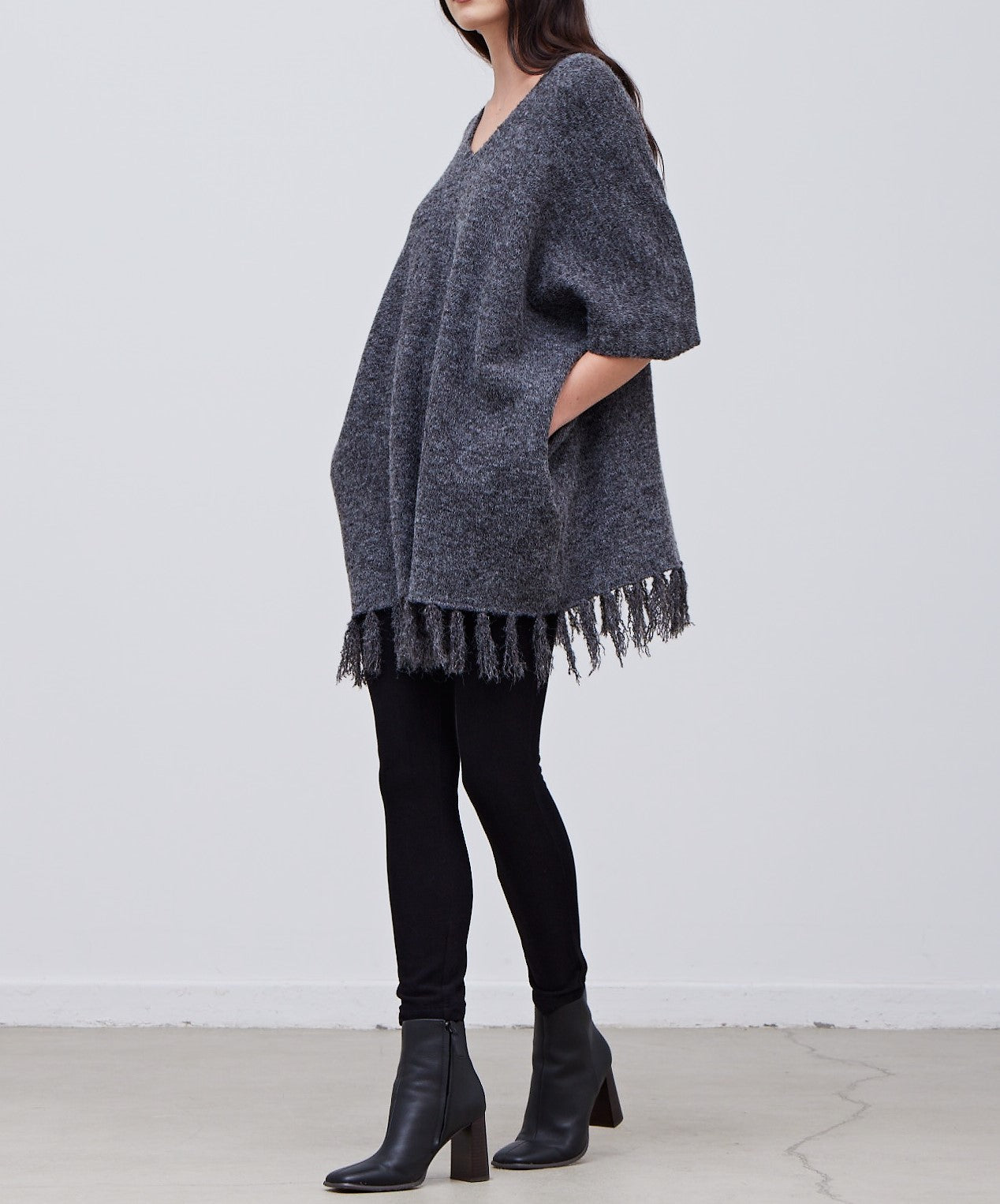 FRINGE HEM KNIT PONCHO
