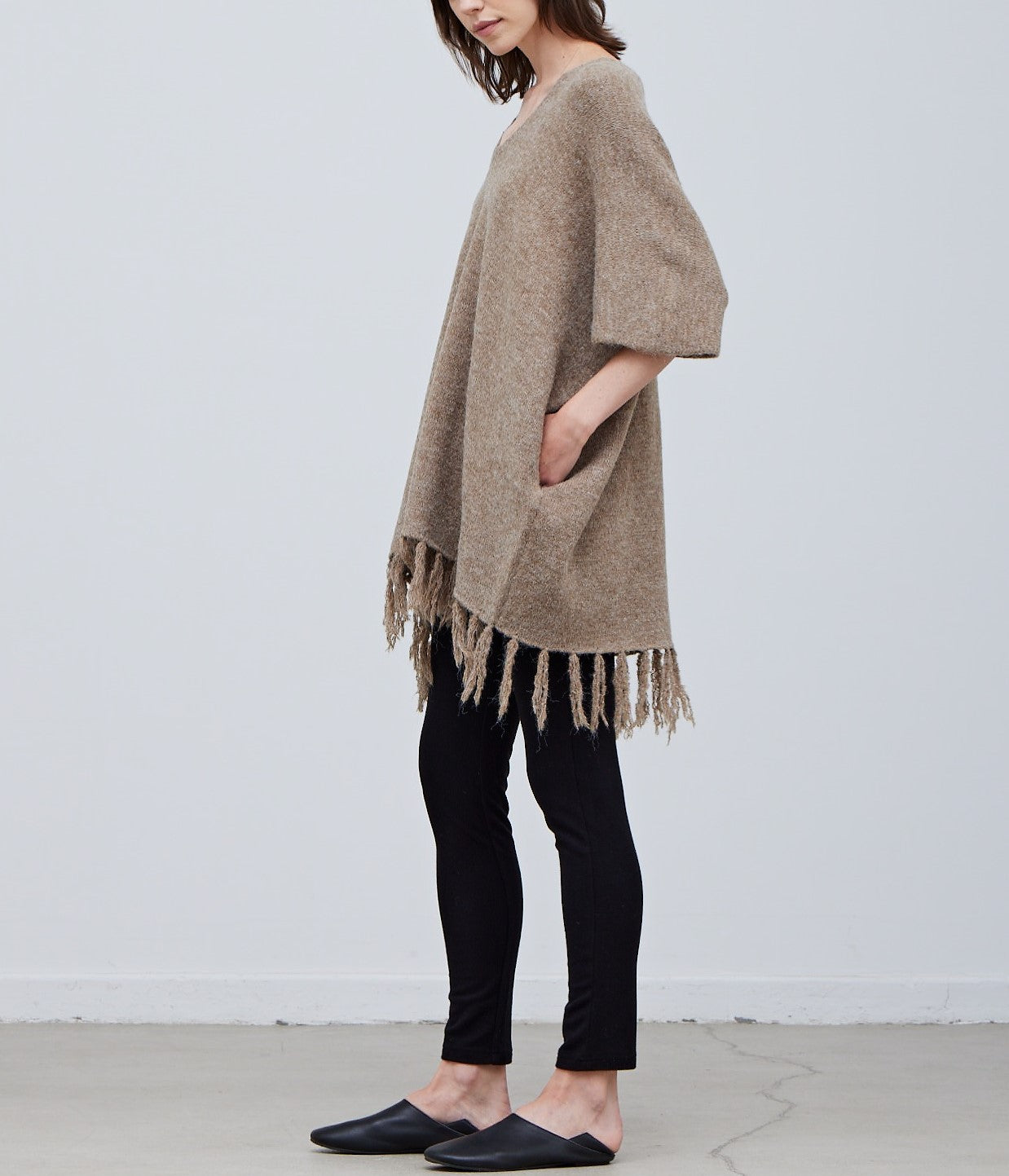 FRINGE HEM KNIT PONCHO